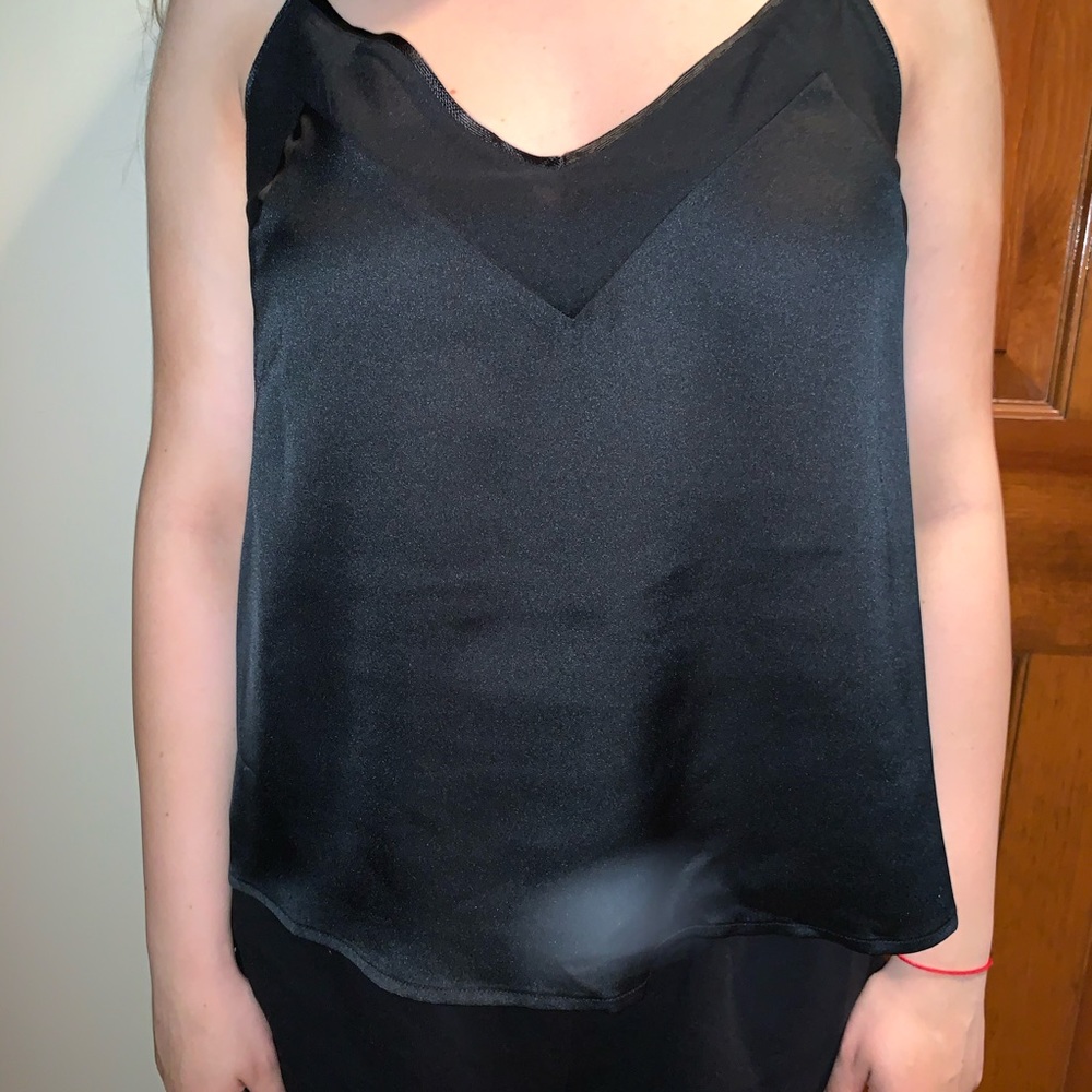 Black going out top
